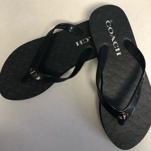 Black coach flip flops. New without tags
